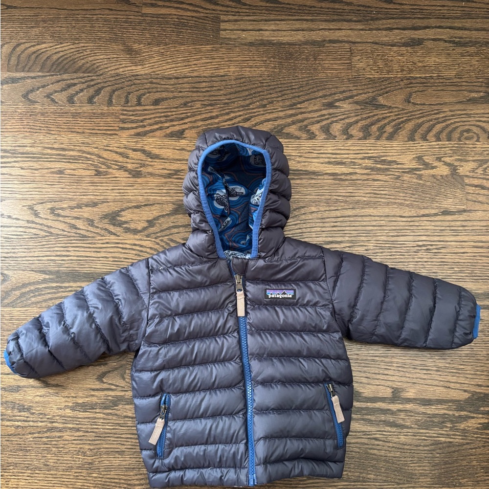 Patagonia Dark Navy Hooded Puffer Jacket with Blue Accents